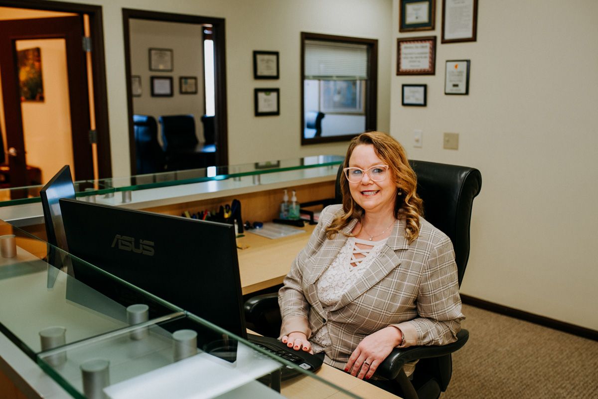 receptionist ready to greet tax prep clients